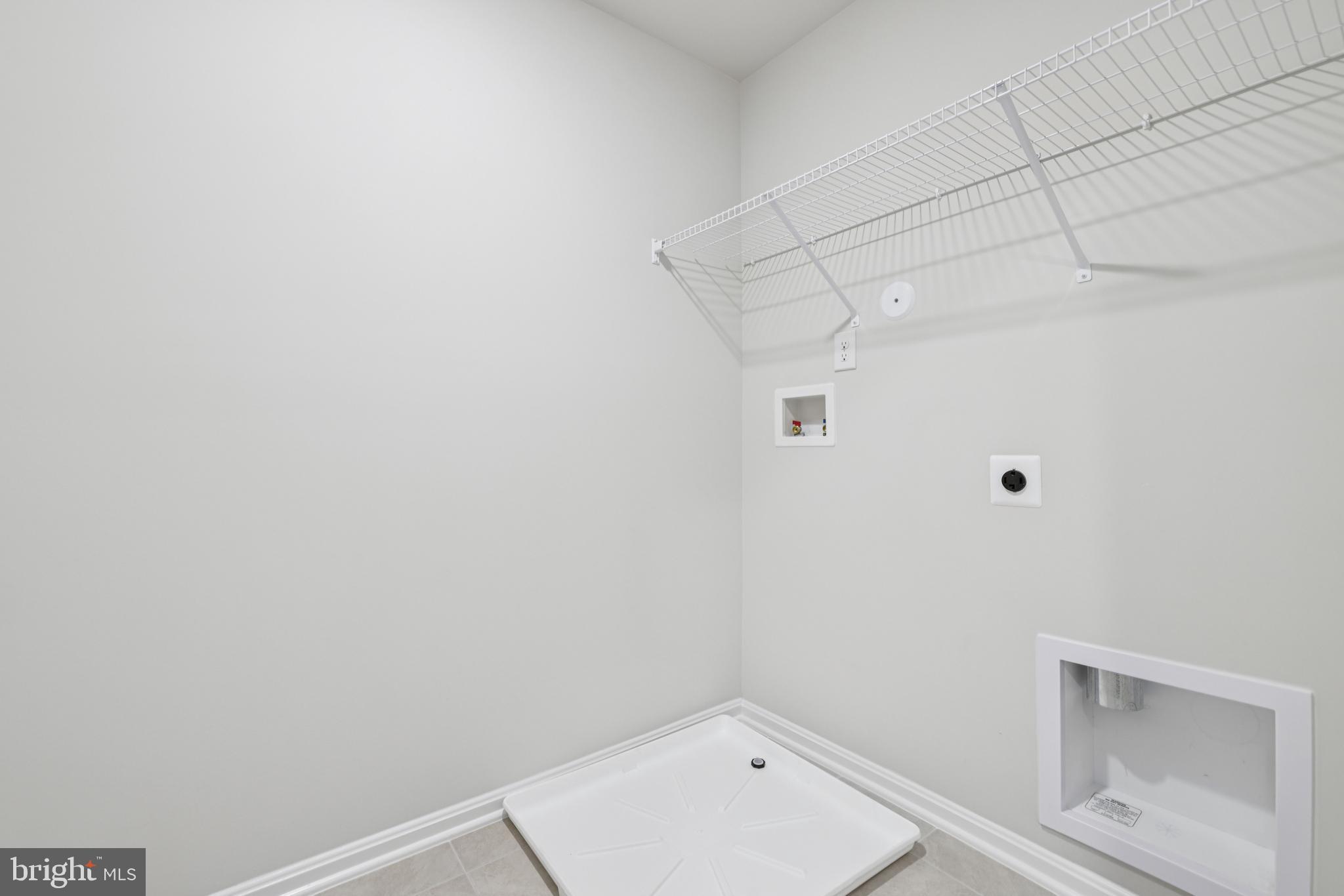 470 Herringbone Way Frederick, MD 21701 - Photo 47 of 61 a view of a room with racks on the wall