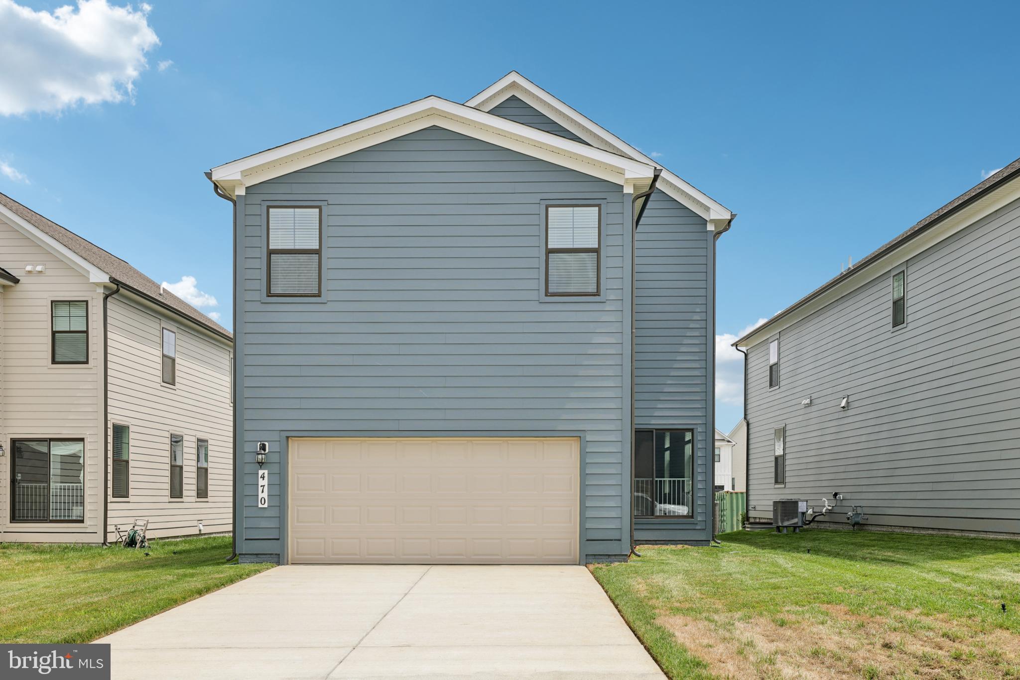 470 Herringbone Way Frederick, MD 21701 - Photo 58 of 61 a front view of a house with a yard