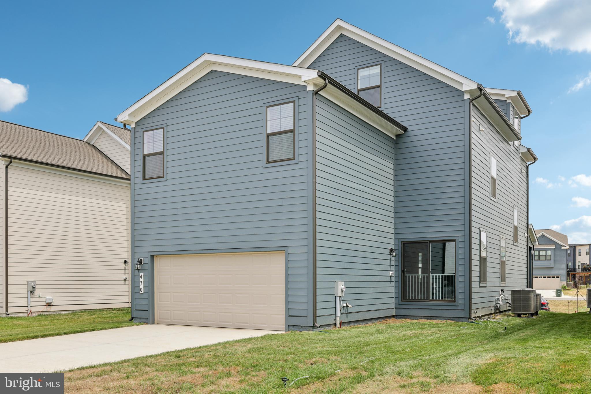 470 Herringbone Way Frederick, MD 21701 - Photo 59 of 61 a front view of a house with a garden