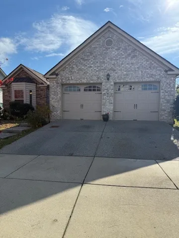 a view of backyard with green space