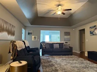 a living room with furniture and a couch