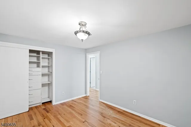 a view of a room with closet and racks