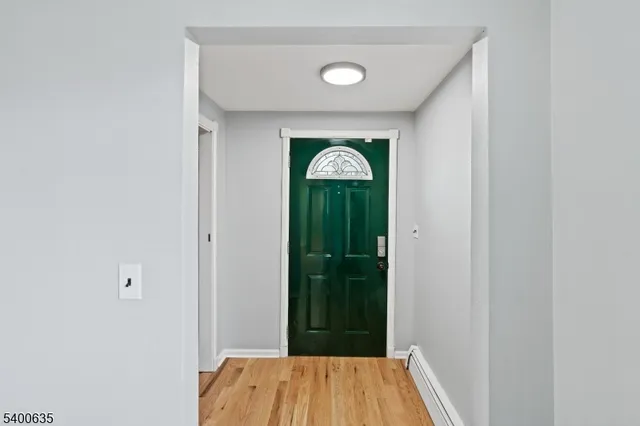 a view of a hallway with entryway