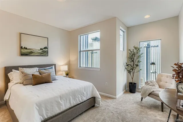 a bedroom with a bed and furniture