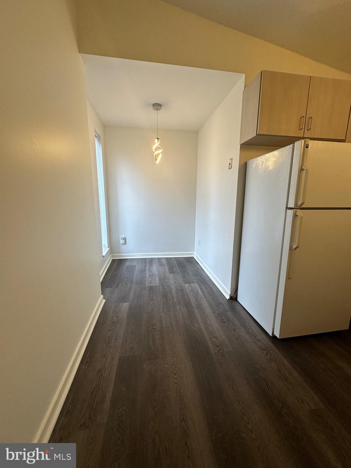 2300 South 12th Street, Unit 1 Philadelphia, PA 19148 - Photo 4 of 19 a view of a hallway with wooden floor