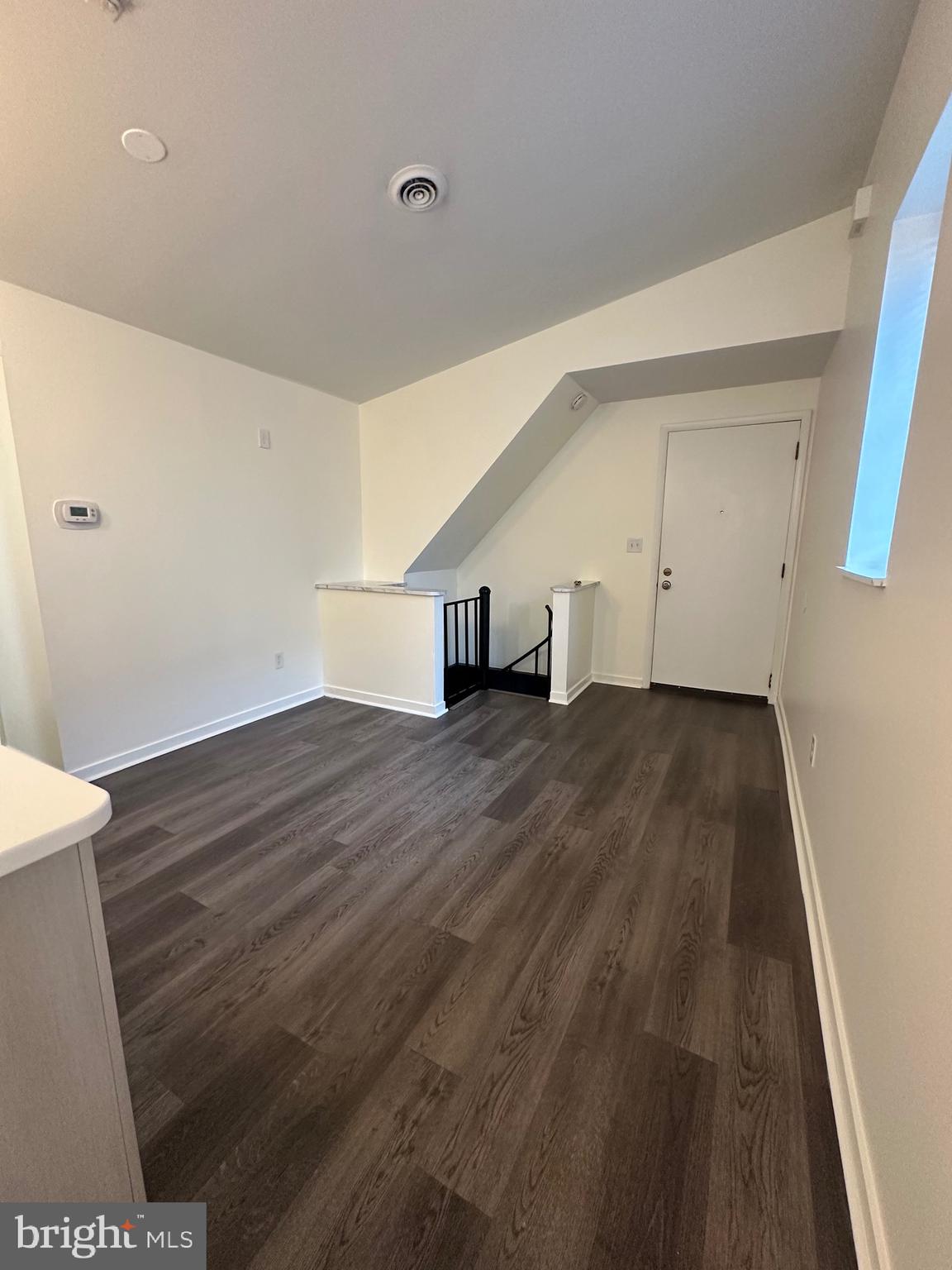2300 South 12th Street, Unit 1 Philadelphia, PA 19148 - Photo 6 of 19 a view of a room with wooden floor and a sink