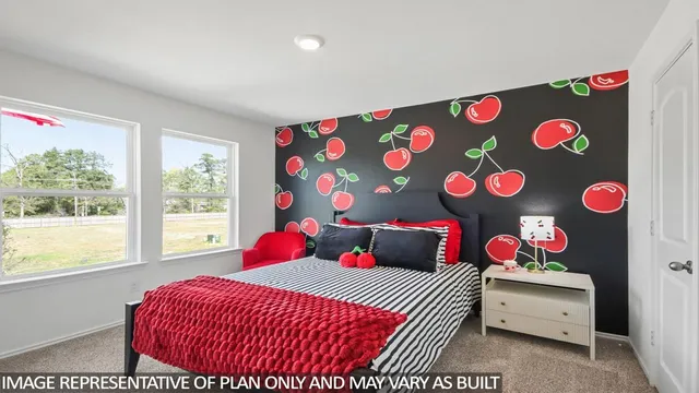 a bedroom with a bed and a table in it