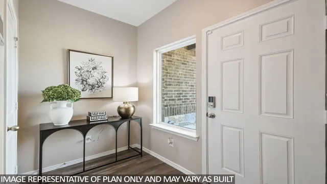 a kitchen with stainless steel appliances kitchen island granite countertop a stove a sink a microwave a dining table and chairs