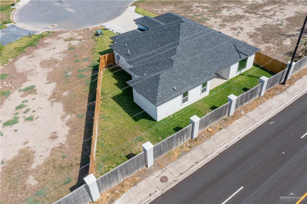 2112 North 28th Street Hidalgo, TX 78557 - Photo 21 of 22 a aerial view of a house with a yard and potted plants