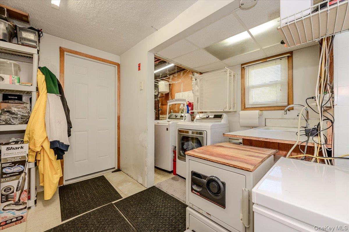 784 Newbridge Road Bellmore, NY 11710 - Photo 22 of 27 Laundry/Storage Rm on lower level w/access to garage