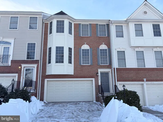 a front view of residential houses