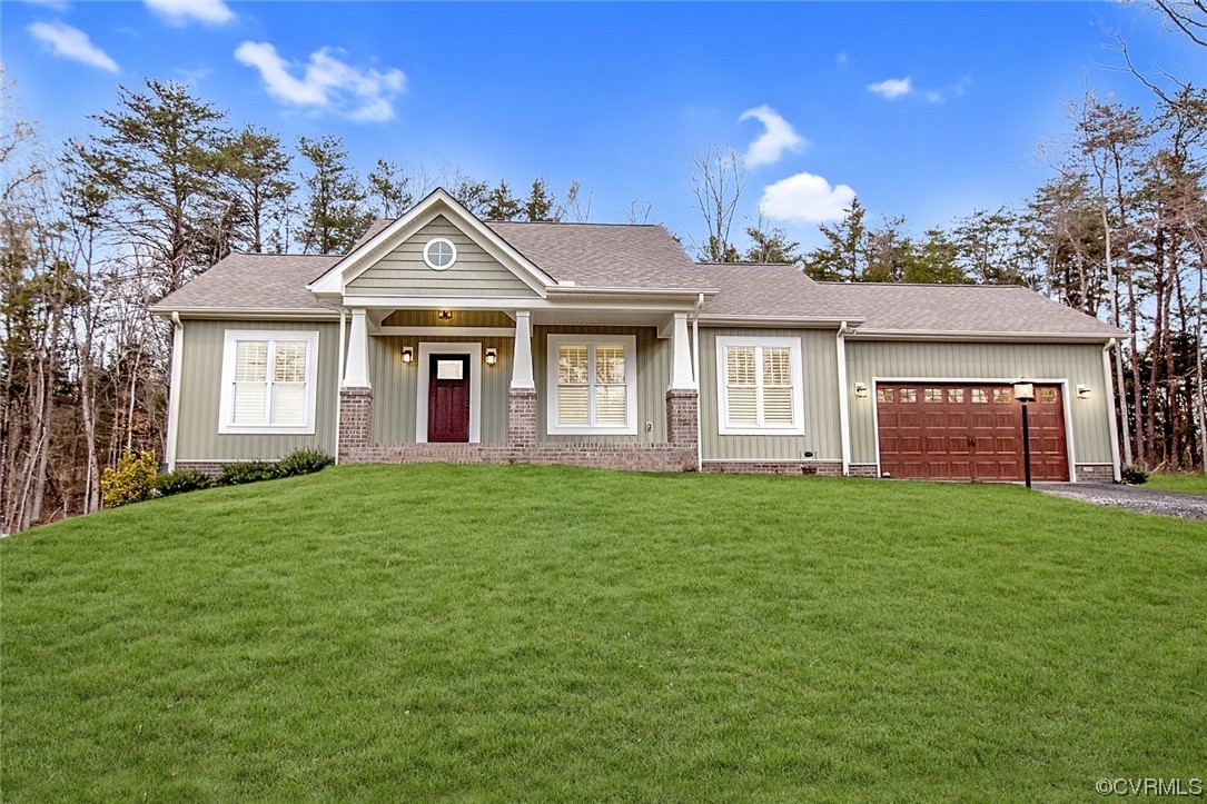 3659 Old Ridge Road Farmville, VA 23901 - Photo 1 of 44 a front view of a house with a garden and yard