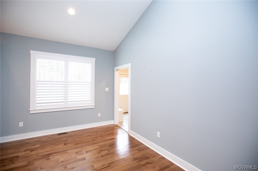 3659 Old Ridge Road Farmville, VA 23901 - Photo 17 of 44 an empty room with wooden floor and windows