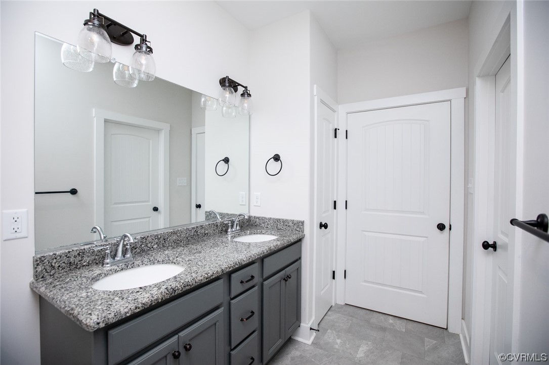 3659 Old Ridge Road Farmville, VA 23901 - Photo 27 of 44 a bathroom with a granite countertop sink and a mirror