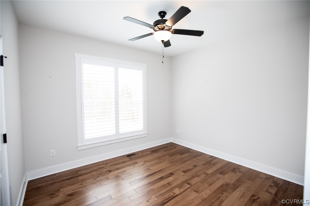 3659 Old Ridge Road Farmville, VA 23901 - Photo 28 of 44 an empty room with wooden floor and windows