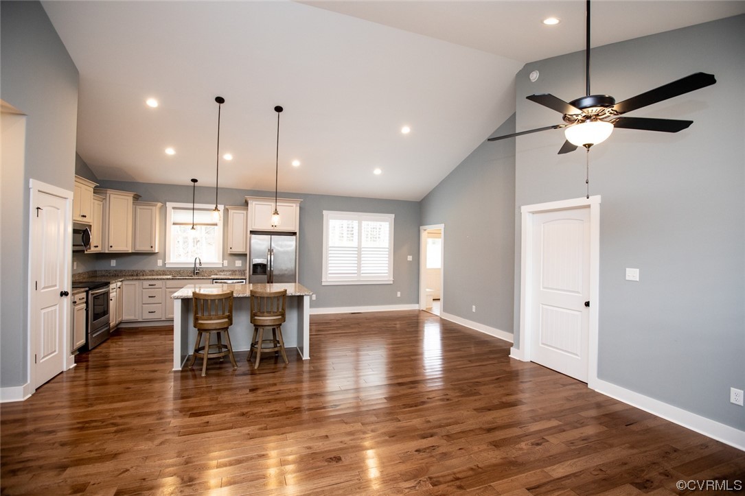 3659 Old Ridge Road Farmville, VA 23901 - Photo 8 of 44 a view of a dining room and livingroom with furniture wooden floor a chandelier