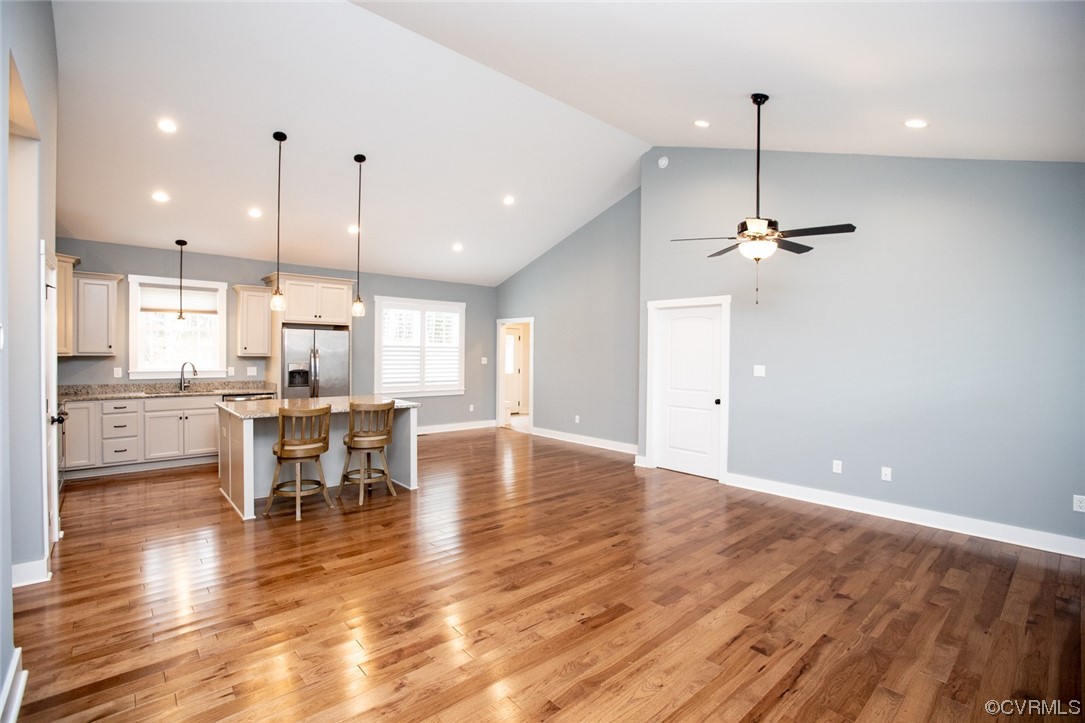 3659 Old Ridge Road Farmville, VA 23901 - Photo 9 of 44 a view of a dining room and livingroom with furniture wooden floor a chandelier