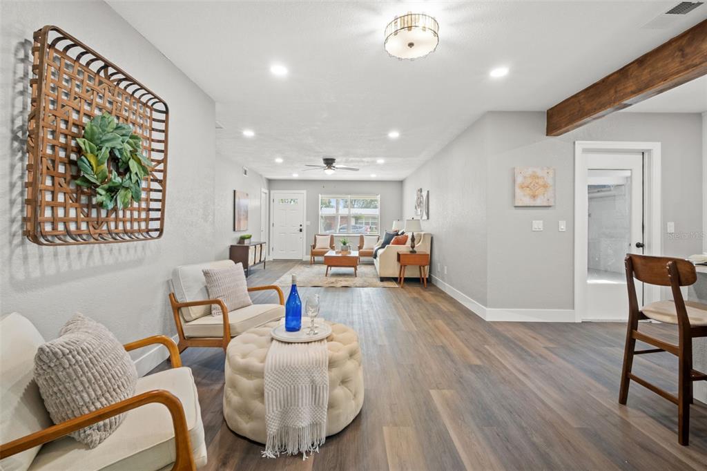 1472 Ruth Road Dunedin, FL 34698 - Photo 16 of 50 a living room with furniture and a wooden floor