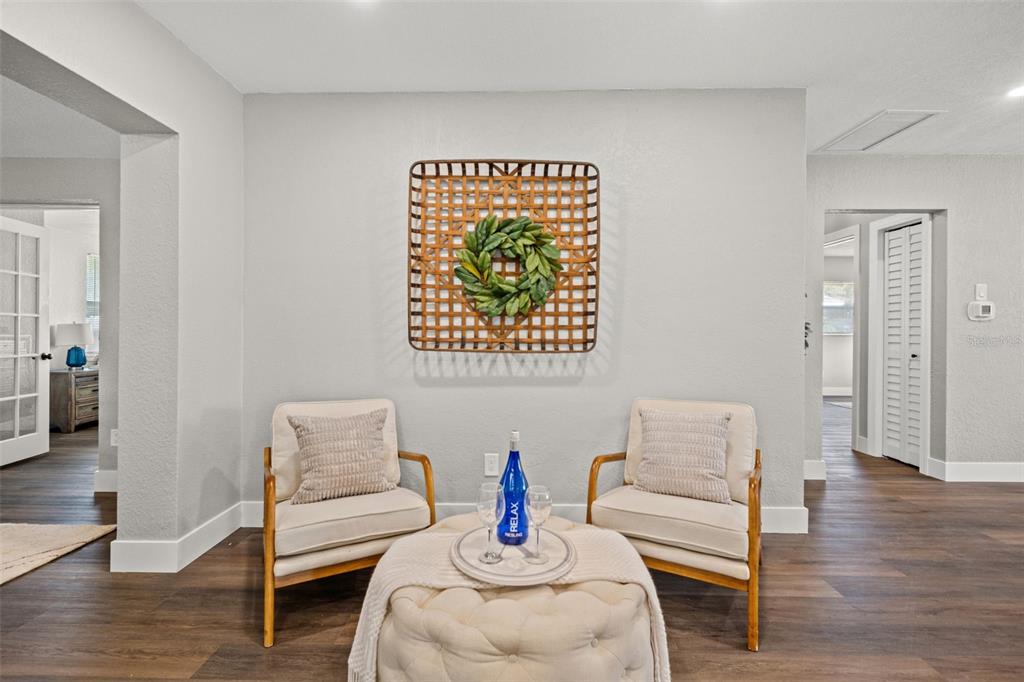 1472 Ruth Road Dunedin, FL 34698 - Photo 19 of 50 a living room with furniture and a wooden floor