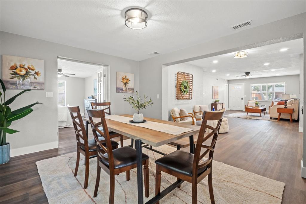 1472 Ruth Road Dunedin, FL 34698 - Photo 21 of 50 a view of a dining room with furniture and wooden floor