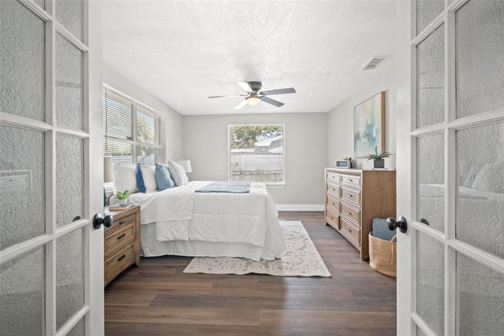 1472 Ruth Road Dunedin, FL 34698 - Photo 22 of 50 a living room with furniture and a large window