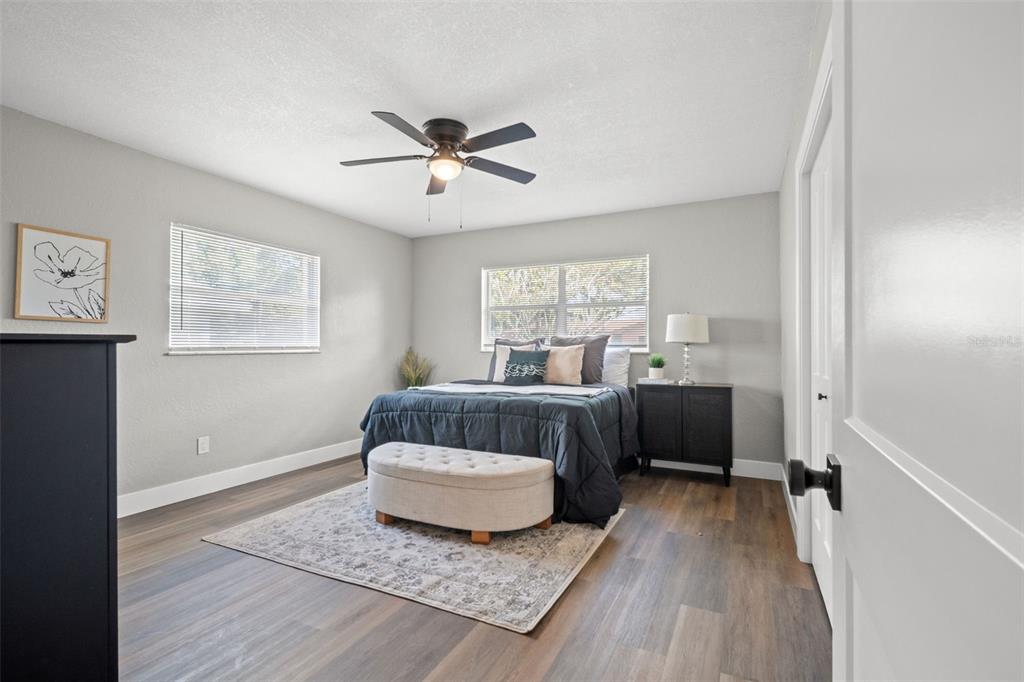 1472 Ruth Road Dunedin, FL 34698 - Photo 28 of 50 a living room with furniture and a wooden floor