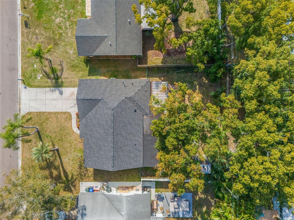 1472 Ruth Road Dunedin, FL 34698 - Photo 43 of 50 an aerial view of a house with a yard basket ball court and outdoor seating