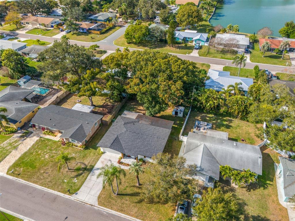1472 Ruth Road Dunedin, FL 34698 - Photo 44 of 50 an aerial view of residential houses with outdoor space
