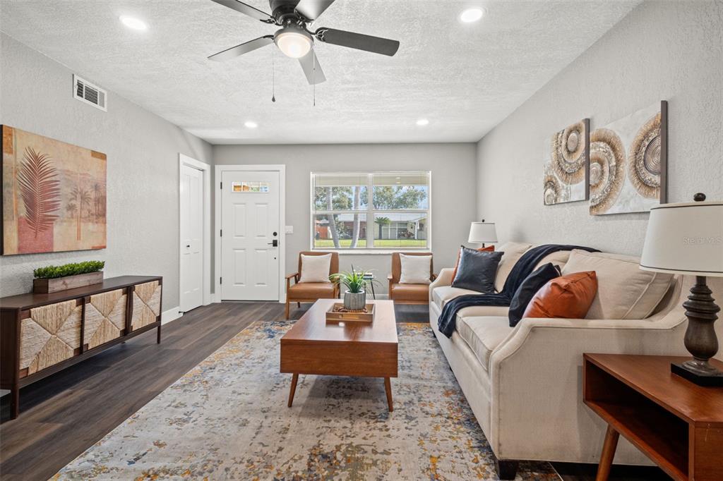 1472 Ruth Road Dunedin, FL 34698 - Photo 5 of 50 a living room with furniture and a large window