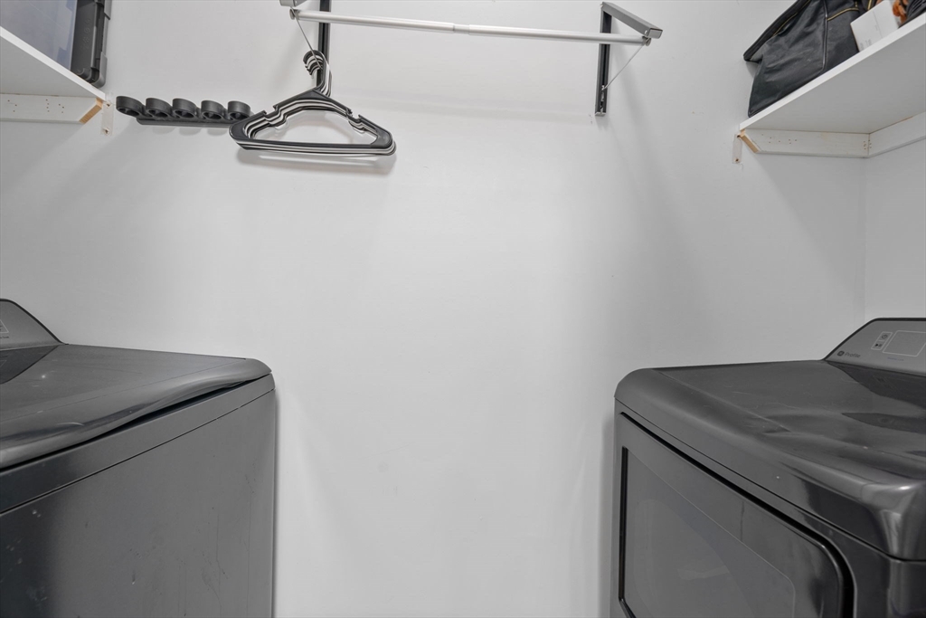 21 Hampshire Road, Unit 412 Methuen, MA 01844 - Photo 11 of 37 a utility room with dryer and washer