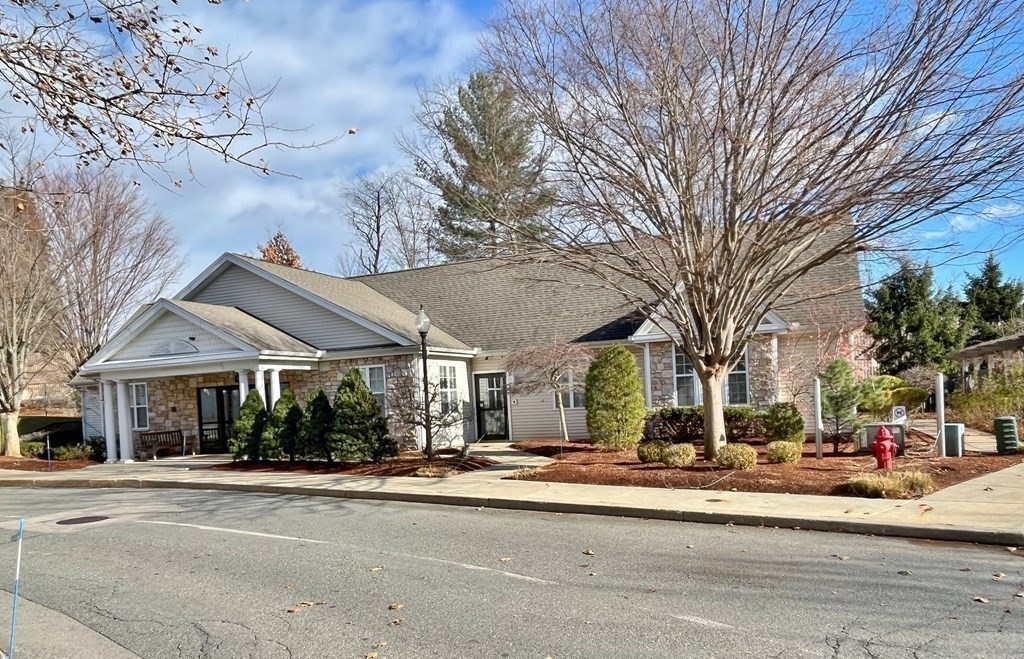 21 Hampshire Road, Unit 412 Methuen, MA 01844 - Photo 32 of 37 a front view of a building with street view