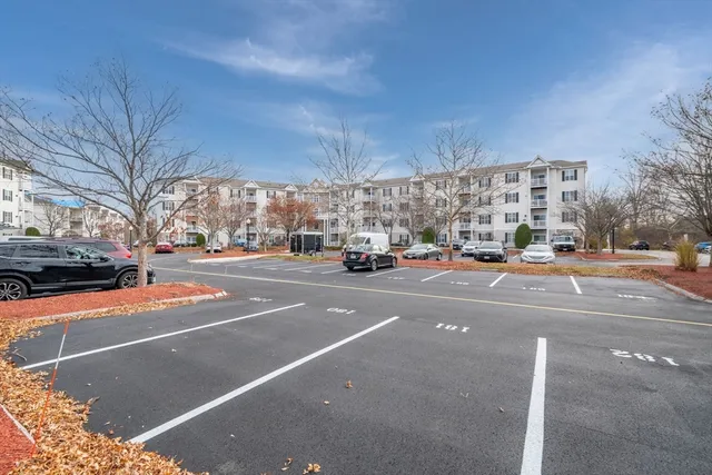 a city street lined with buildings and cars