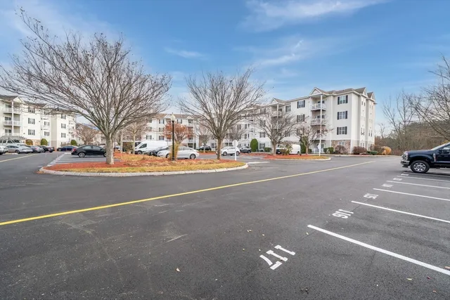 a street sign on a brick wall