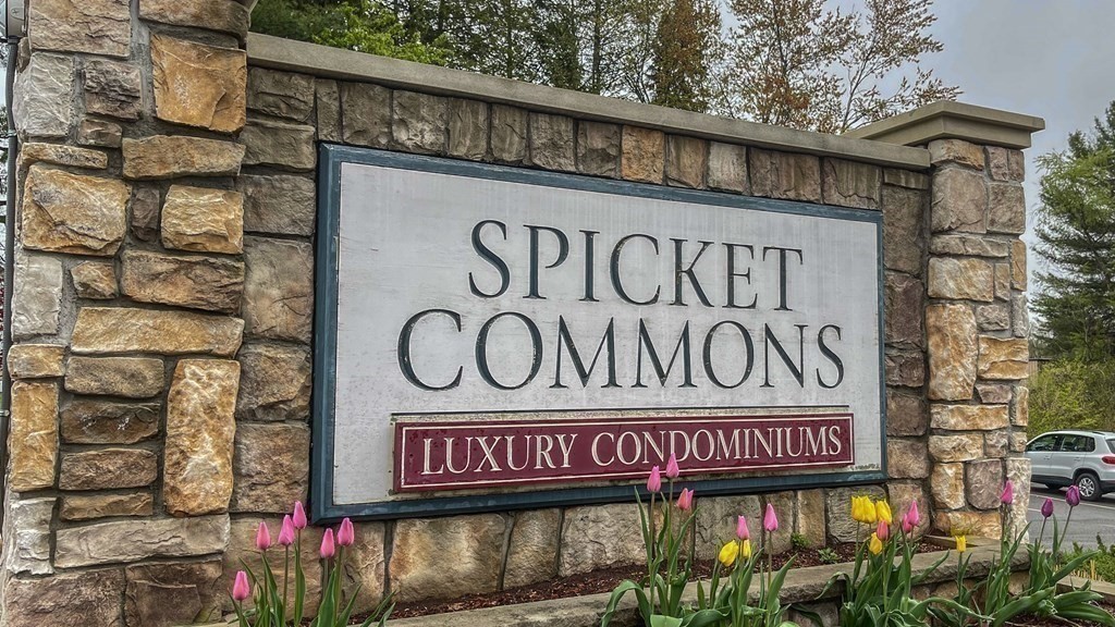 21 Hampshire Road, Unit 412 Methuen, MA 01844 - Photo 36 of 37 a street sign on a brick wall