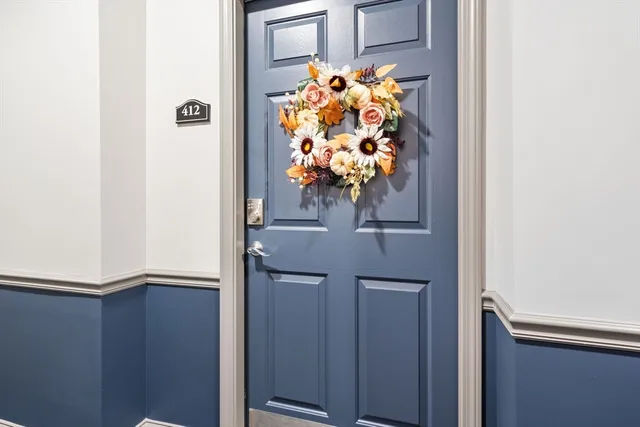 a kitchen with stainless steel appliances a stove a microwave and cabinets
