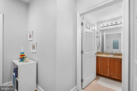a very nice looking open kitchen with a stove a sink dishwasher and a refrigerator