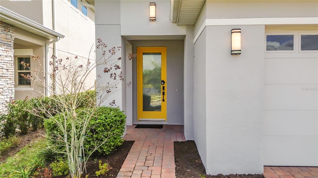 7541 Wing Span Way Harmony, FL 34773 - Photo 3 of 49 a view of a front door of the house