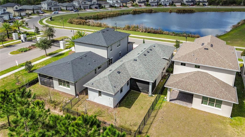 7541 Wing Span Way Harmony, FL 34773 - Photo 35 of 49 an aerial view of a house with a lake view