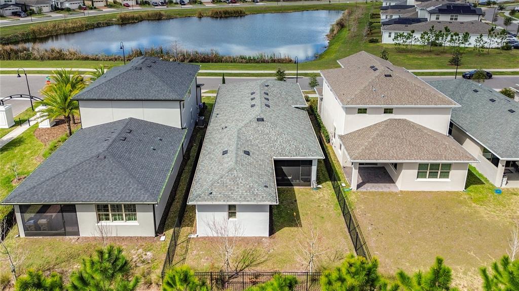 7541 Wing Span Way Harmony, FL 34773 - Photo 38 of 49 an aerial view of a house with a swimming pool