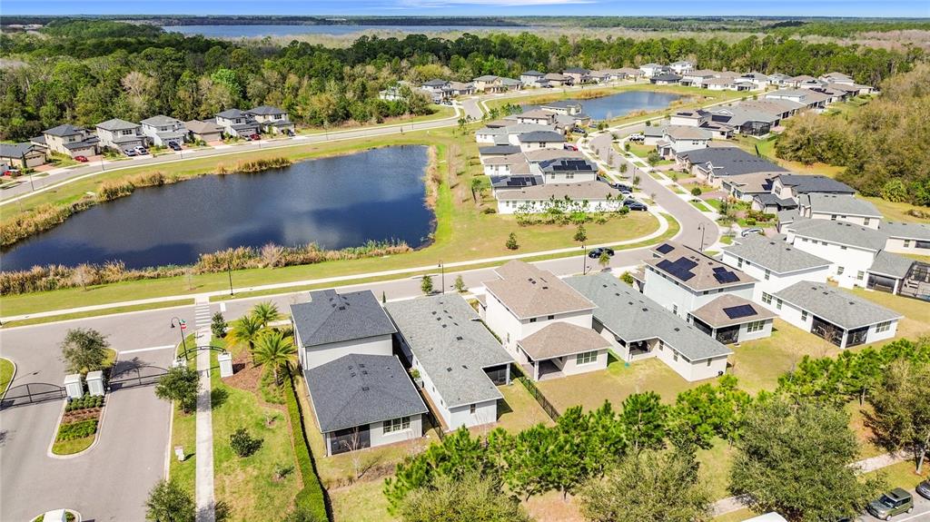 7541 Wing Span Way Harmony, FL 34773 - Photo 39 of 49 an aerial view of residential houses with outdoor space