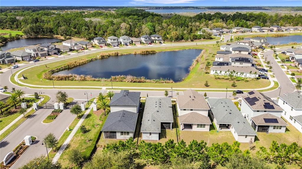 7541 Wing Span Way Harmony, FL 34773 - Photo 44 of 49 an aerial view of a house with a swimming pool
