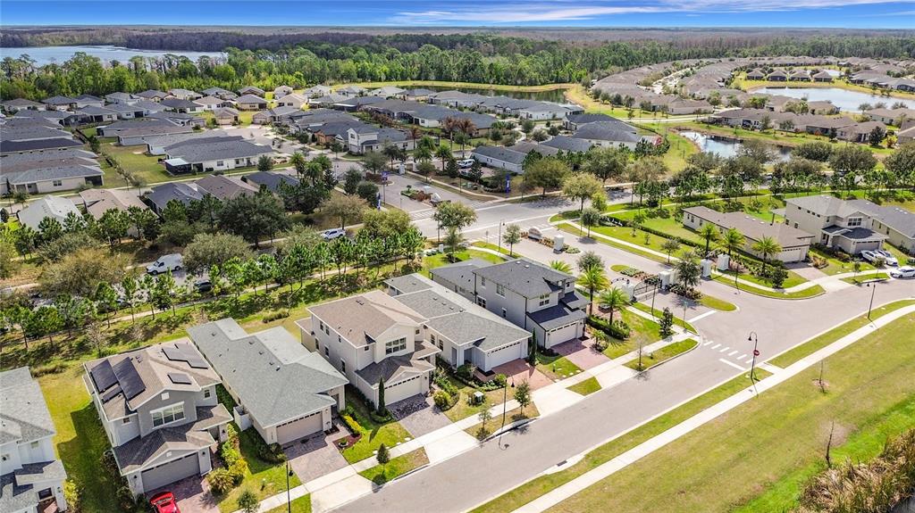 7541 Wing Span Way Harmony, FL 34773 - Photo 45 of 49 an aerial view of residential houses with outdoor space
