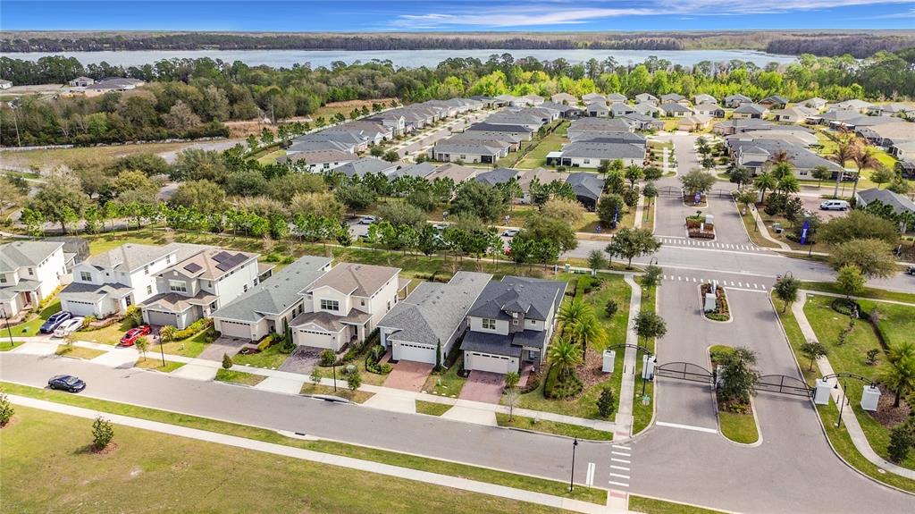 7541 Wing Span Way Harmony, FL 34773 - Photo 47 of 49 an aerial view of a swimming pool and mountain view