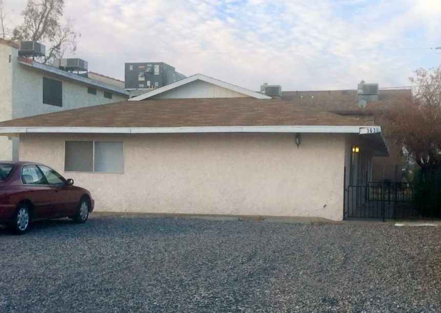 363 Rio Grande Court, Unit B Bullhead City, AZ 86442 - Photo 1 of 16 a front view of a house with parking space