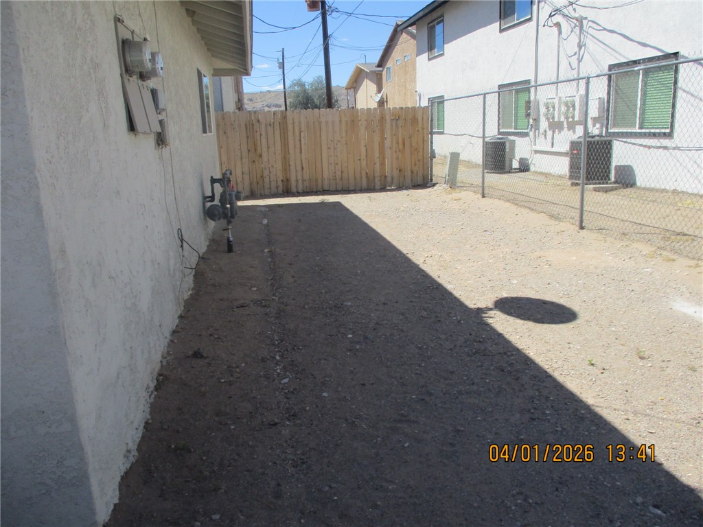 363 Rio Grande Court, Unit B Bullhead City, AZ 86442 - Photo 15 of 16 a view of a backyard of the house