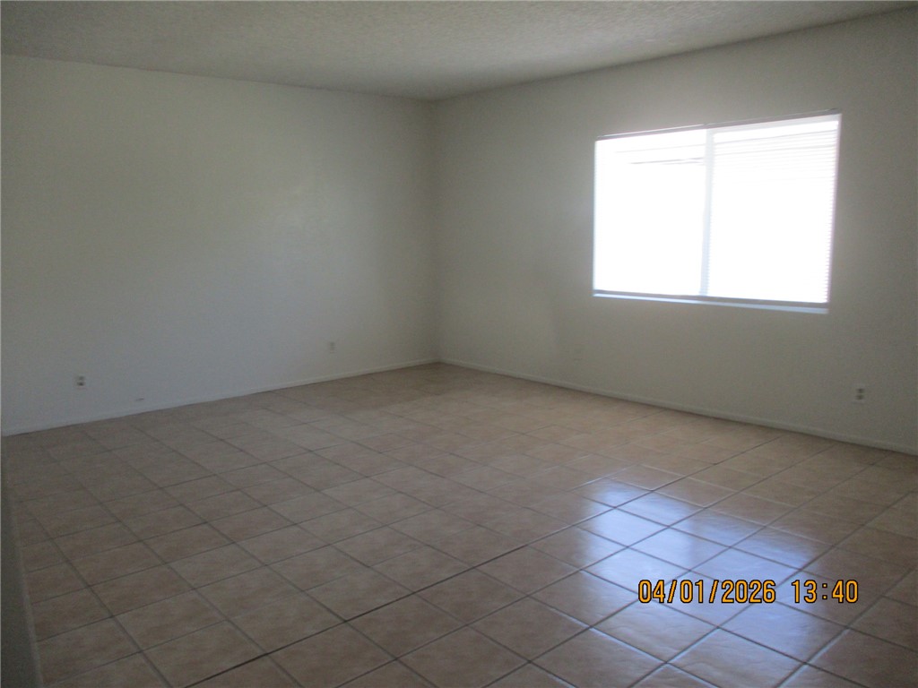 363 Rio Grande Court, Unit B Bullhead City, AZ 86442 - Photo 3 of 16 an empty room with a window