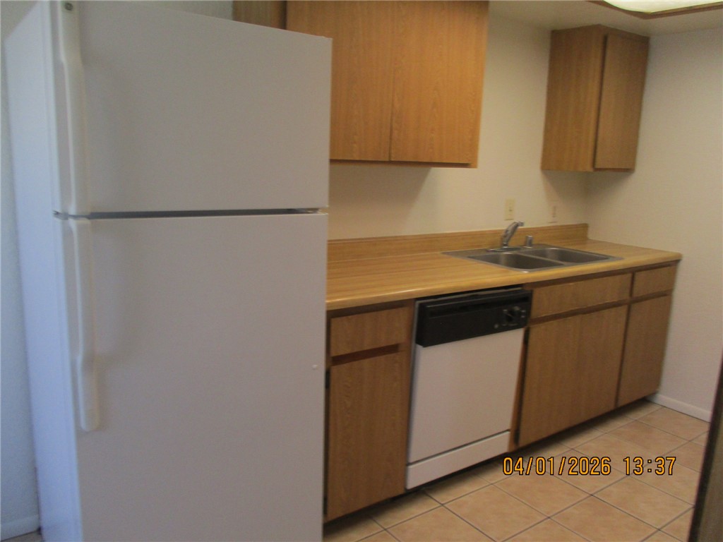 363 Rio Grande Court, Unit B Bullhead City, AZ 86442 - Photo 5 of 16 a utility room with dryer and washer
