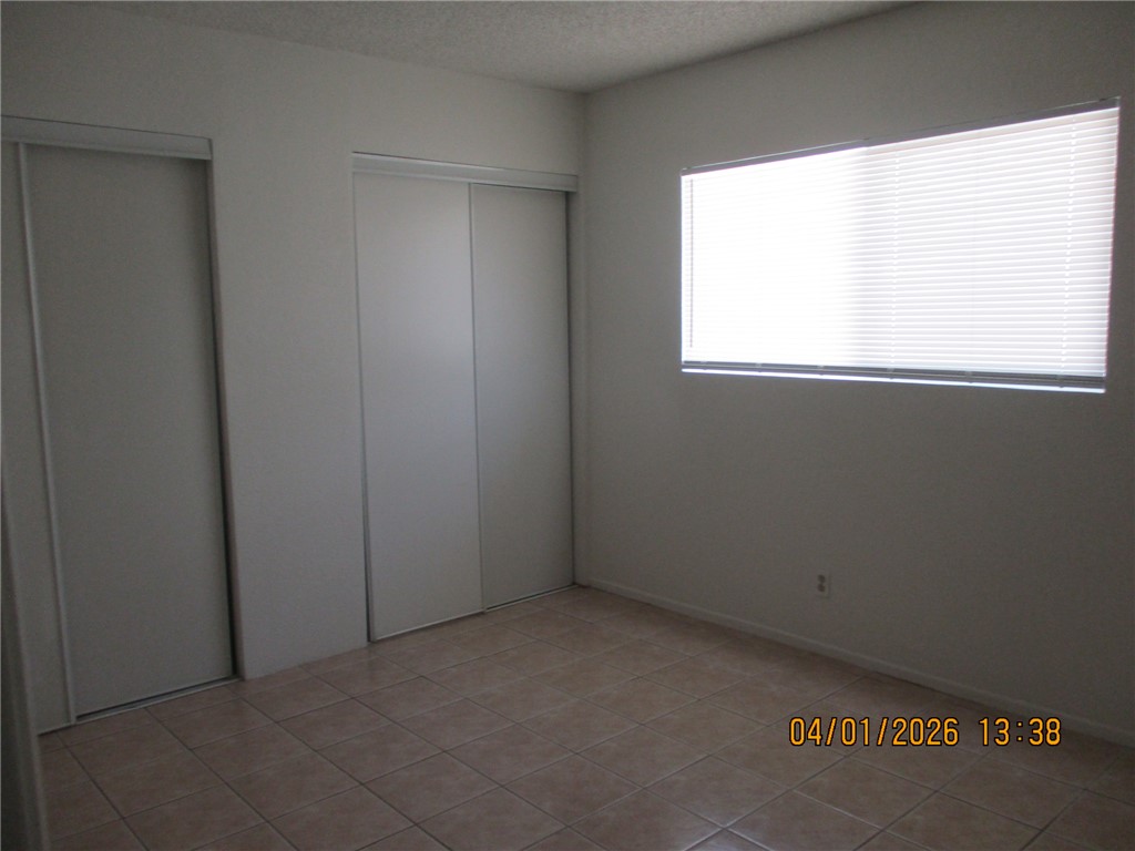 363 Rio Grande Court, Unit B Bullhead City, AZ 86442 - Photo 10 of 16 an empty room with a window