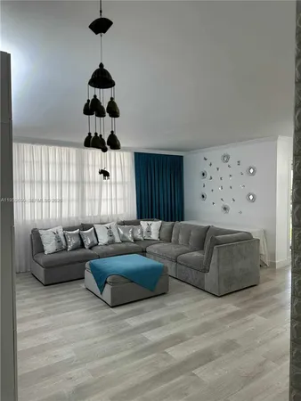 a living room with furniture and a couch