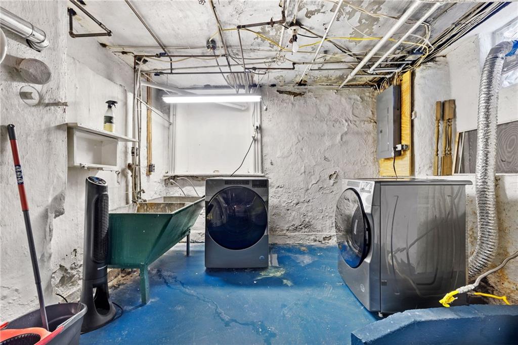 295 Fisk Street Pittsburgh, PA 15201 - Photo 23 of 29 a living room with furniture and a fireplace